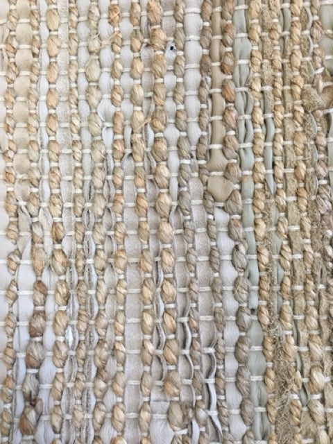 Rustic Charm Natural is a hand woven natural jute and leather carpet. Colour Natural Jute with a beige/grey leather accents. Sizes 200 X 290, 240 X 320 and 300 X 400. Close.