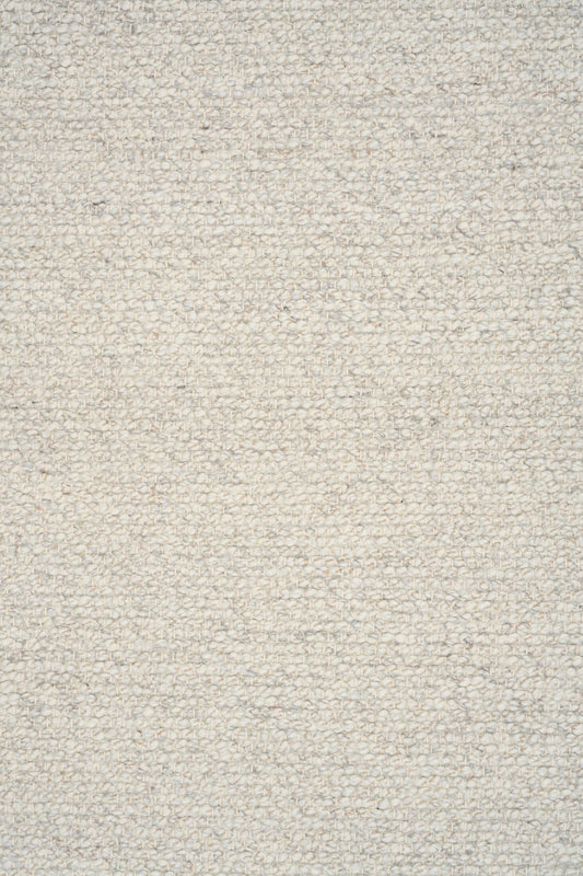 Sahara Grey Rug – hand woven 100% wool rug in soft neutral tones with a textured finish, available in three sizes, styled for modern and coastal homes. Close.