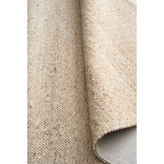 Savoy Brown hand-woven wool flatweave rug in a warm earthy brown, with a fine box-weave texture. 4 Size options. Roll.