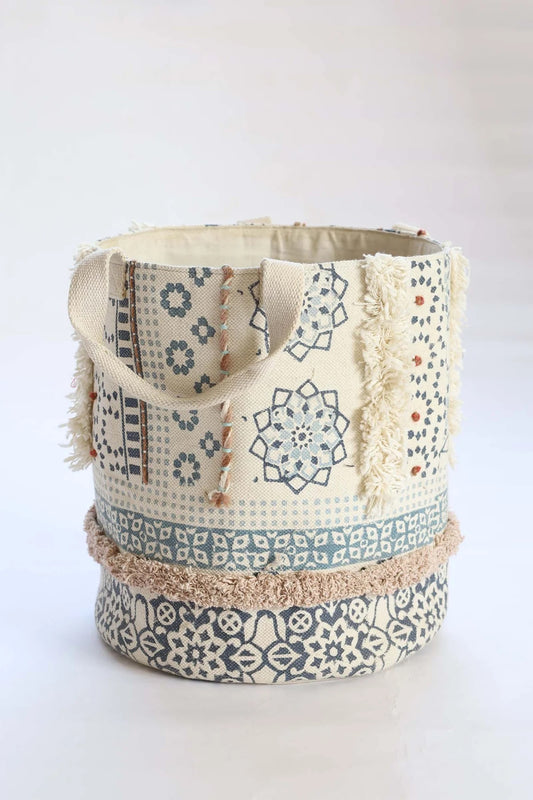 The Super Sonic basket is crafted by skilled artisans in India. Crafted from cotton, it features bold block print motifs and textured bits of cotton. With 2 handles it's easy to pick up and move around. Colours, cream, grey, dark grey and browns. Size 400 height X 350 diameter. Side Plain.