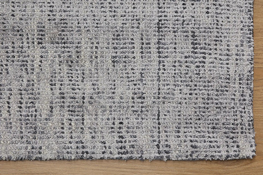 Toro Silver is a hand-loomed, hand-knotted rug with a contemporary multi-fleck design. Wool and silky viscose are blended to create a soft feel with its 10-12mm pile height. Colour Silver with dark grey accents. Sizes 160 X 230, 200 X 290, 240 X 340 and 300 X 400. Corner.