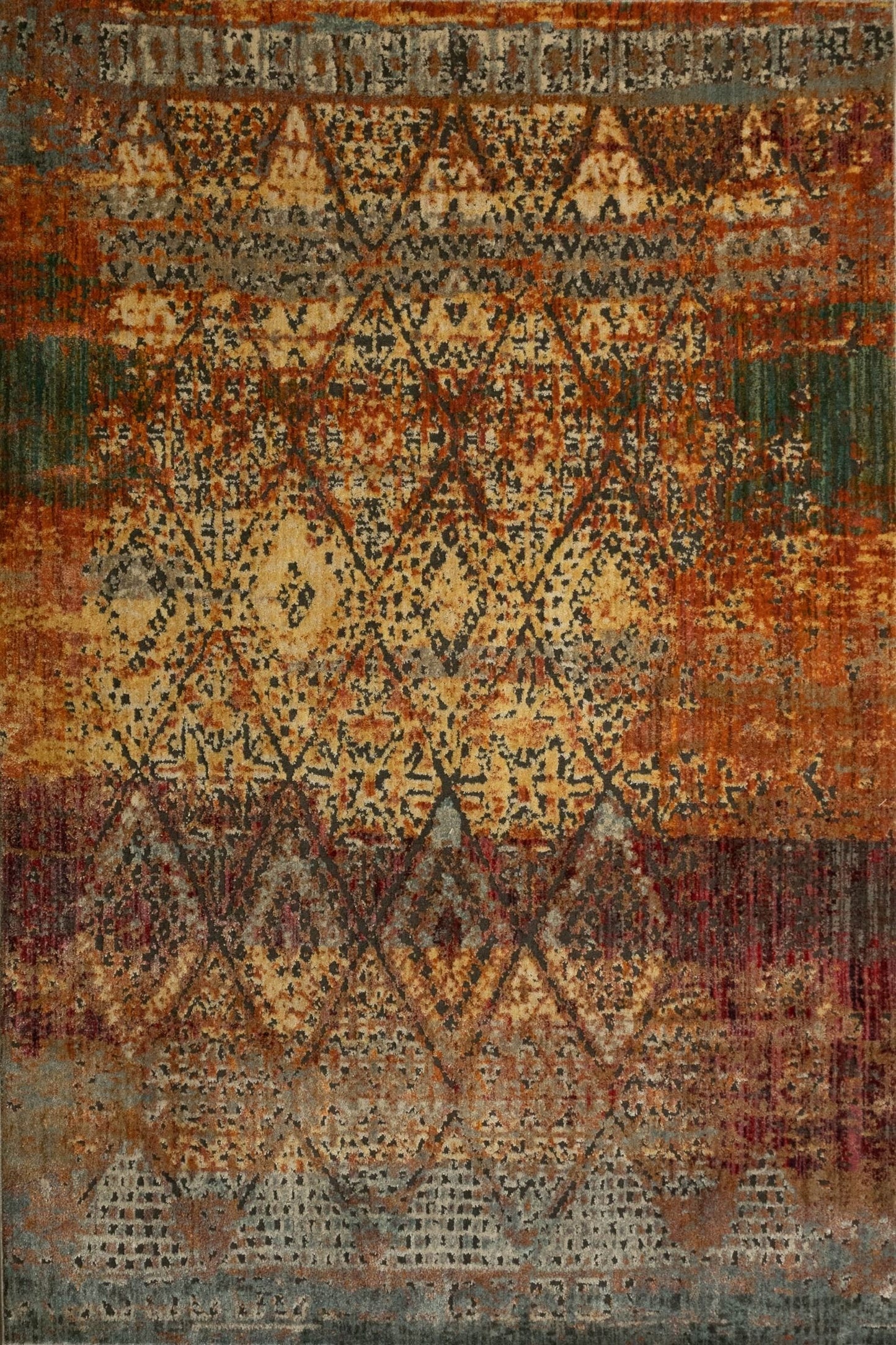 Zarita Noble is a machine made rug from soft and durable polyester. Featuring Tribal diamond patterns. Colours Reds, Golds, Blacks and Light Greys. Sizes 240 X 320 and 300 X 380. Full.