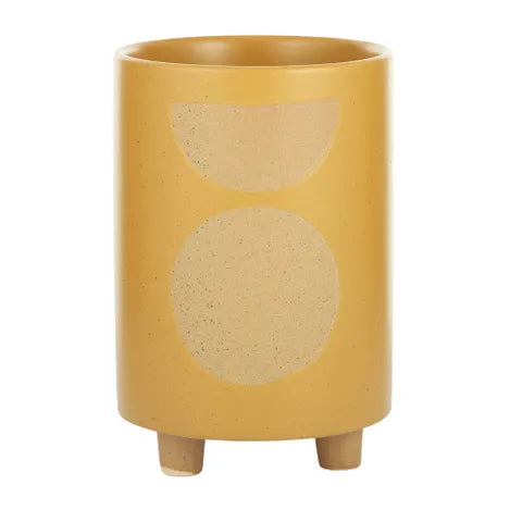 The Zod Ceramic Pot - Large, is a modern simplistic designed planter pot. Its smooth texture and round feet add a modern feel. Colour Orange. Size 14 diameter x 20.5 height. Front Plain.