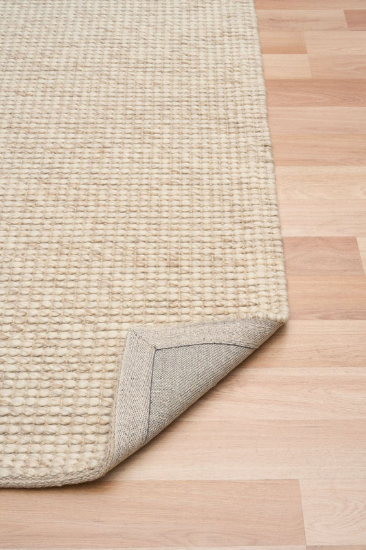 Dasha Runner - Beige is a texture hand woven rug runner made of 80% New Zealand Wool and 20% Polyester. Colour Beige. Size 80 X 320. Fold.