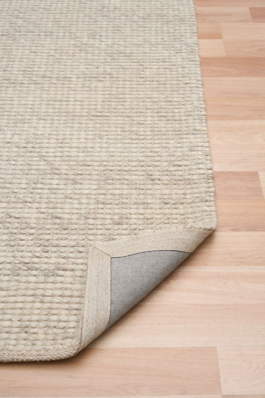 Dasha Runner - Light Grey is a texture hand woven rug runner made of 80% New Zealand Wool and 20% Polyester. Colour Beige. Size 80 X 320. Fold.
