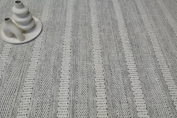 The Albi Collection are hand woven rugs crafted from 100% recycled PET yarn.  Albi comes in 4 colours in 3 sizes.