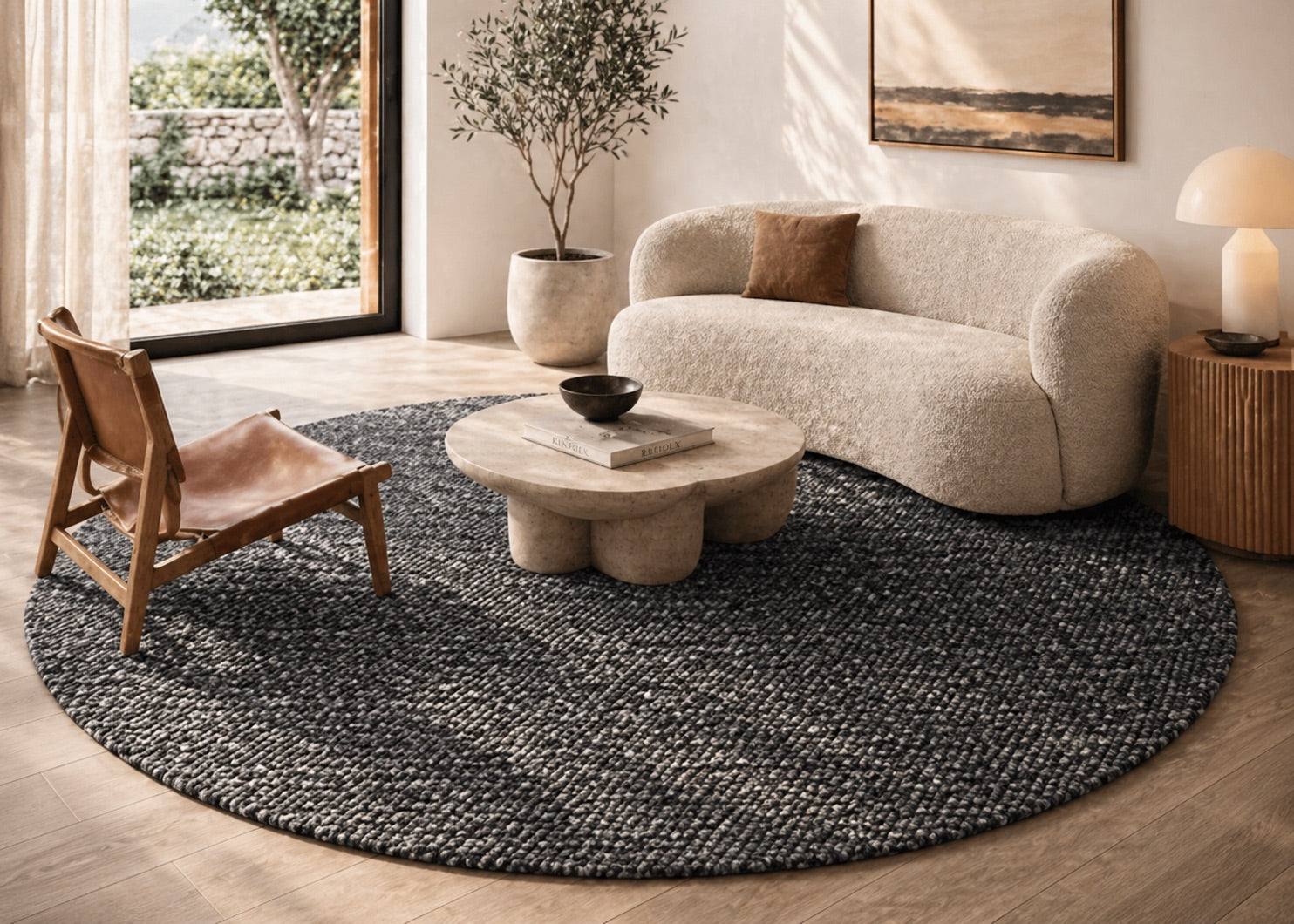 The Avenue Round Textured PET Yarn rug styled in a modern Perth home living room setting.