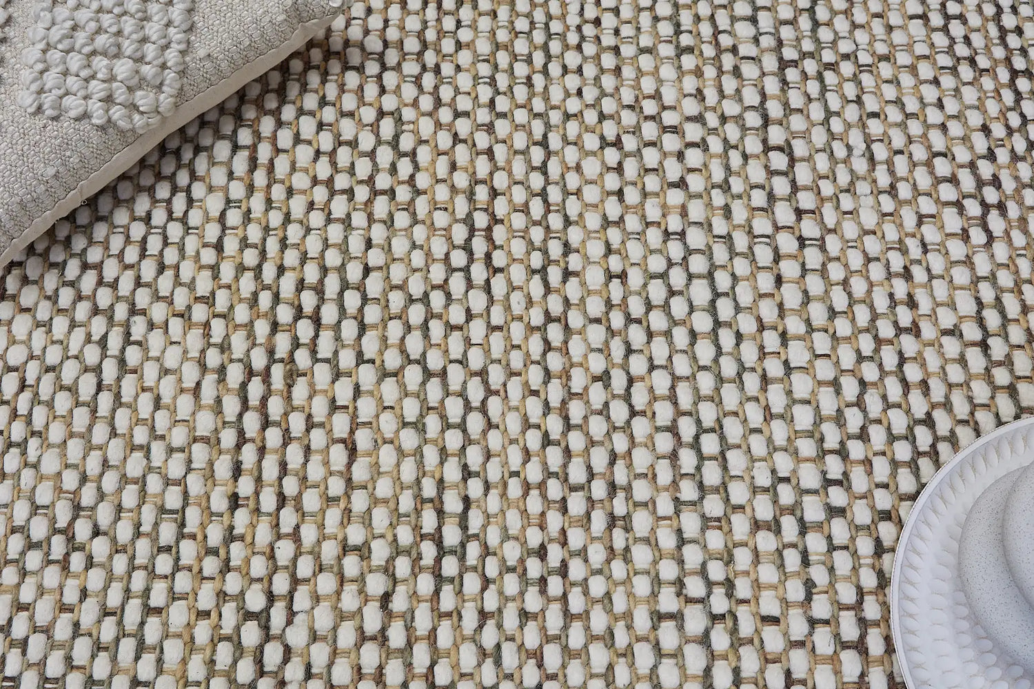 The Fancy Collection, hand woven textured wool rugs. Experience both comfort and style. Select from 4 colours in 4 sizes. Explore these exquisite rugs today!