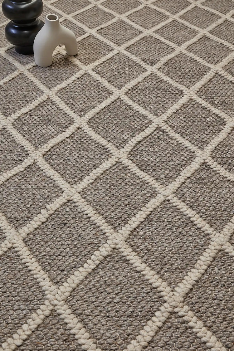 Lounge Collection, luxurious Wool & Bamboo Silk rugs, featuring a Scandinavian design and textured hand loomed pile. Discover 4 colours in 3 sizes.
