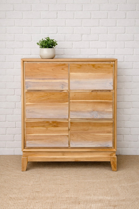 The Acadia 6 Drawer chest is crafted from  solid teak. Its contemporary design gives off a timeless aesthetic. Featuring 6 drawers in a 2 wide x 3 height configuration. Colour natural. Measures 900 Width X 1100 Height X 500 Depth. Styled.