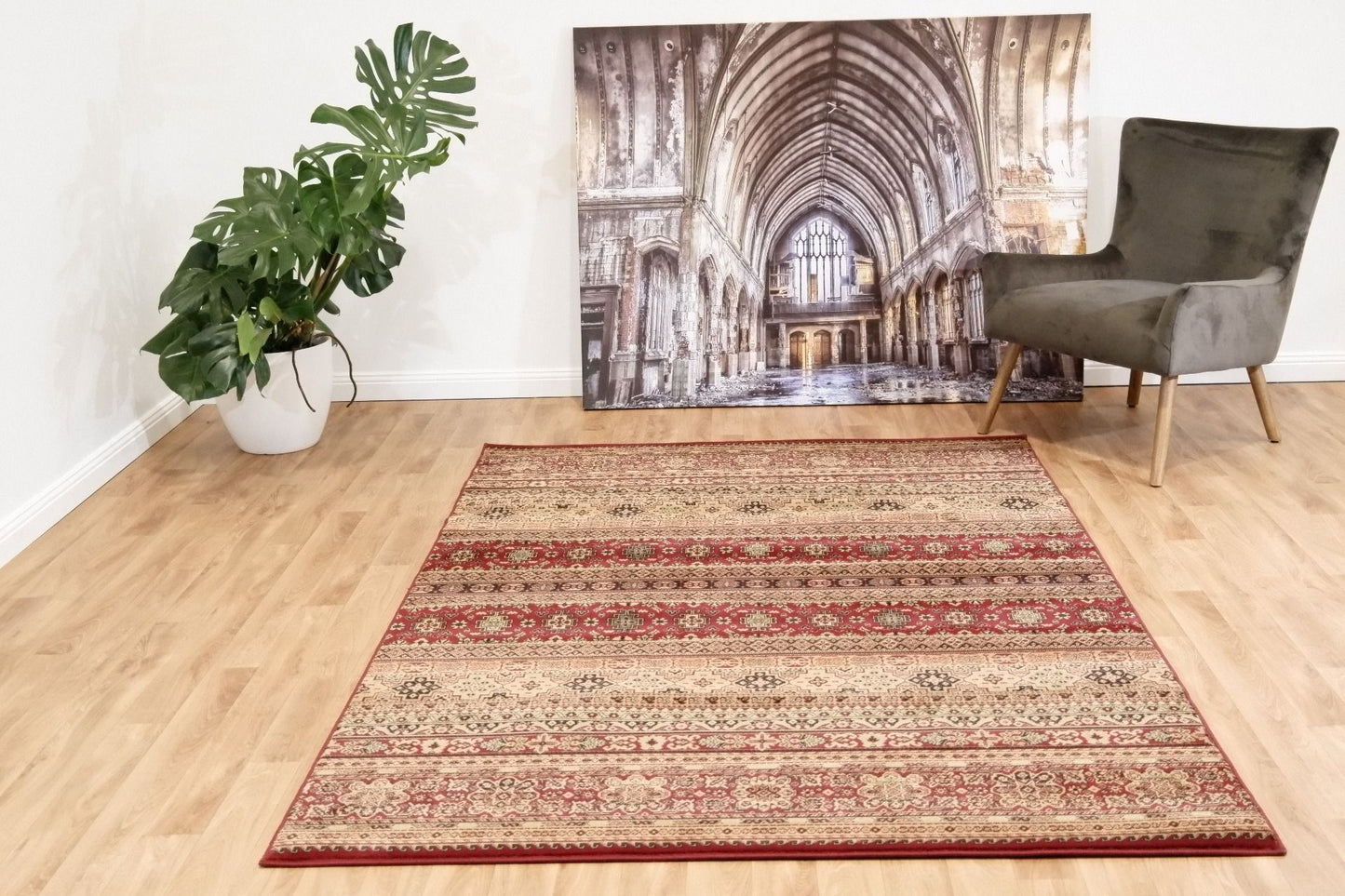 Afghan Red is a machine made rug featuring traditional afghan tribal designs.  Made from  heat-set polypropylene. Colours Reds, Golds, and Blacks.  Sizes. 160 X 235, 200 X 285, 240 X 340 and 300 X 400. Life.