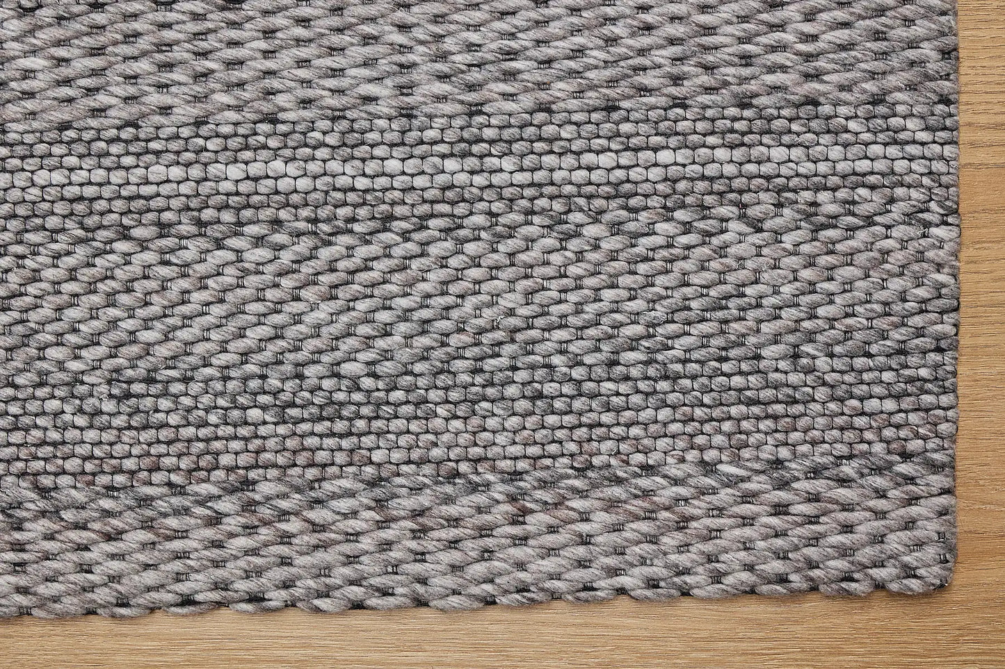 Albi Taupe is a Beige/Grey and Black, PET Yarn (recycled Plastic) Hand woven flatweave rug. Sizes 160 X 230, 200 X 290 and 240 x 340. Corner.