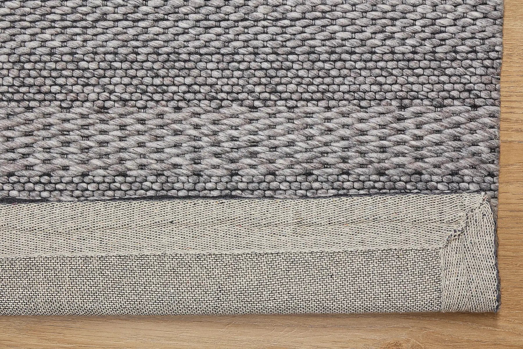 Albi Taupe is a Beige/Grey and Black, PET Yarn (recycled Plastic) Hand woven flatweave rug. Sizes 160 X 230, 200 X 290 and 240 x 340. Fold.