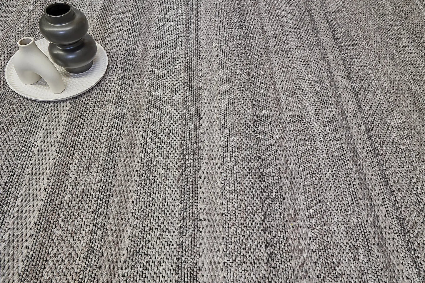 Albi Taupe is a Beige/Grey and Black, PET Yarn (recycled Plastic) Hand woven flatweave rug. Sizes 160 X 230, 200 X 290 and 240 x 340. Life.