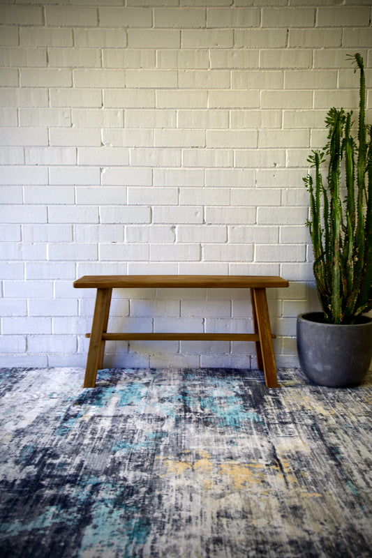 The Amchur 900 Bench is crafted from sustainable recycled teak. Features a solid plank top with A-Frame legs and centre support beam. Colour Natural Teak. Measures 900 Length x 250 Depth x 450 Height. Styled.