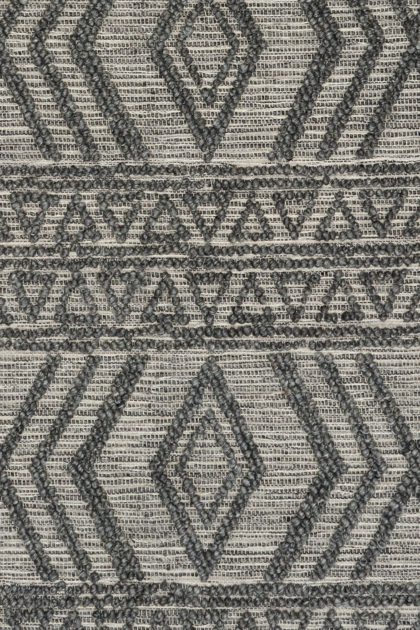 Anita-2 Charcoal is a hand woven textured wool rug. Featuring a tribal geometric design.  Colour Charcoal. Sizes 155 X 225, 200 X 290, 240 X 340 and 300 X 400. Close.