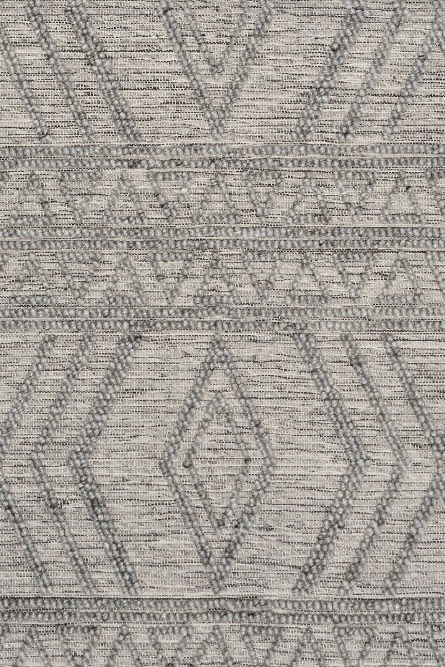 Anita-2 Grey is a hand woven textured wool rug. Featuring a tribal geometric design.  Colour Charcoal. Sizes 155 X 225, 200 X 290, 240 X 340 and 300 X 400. Close.