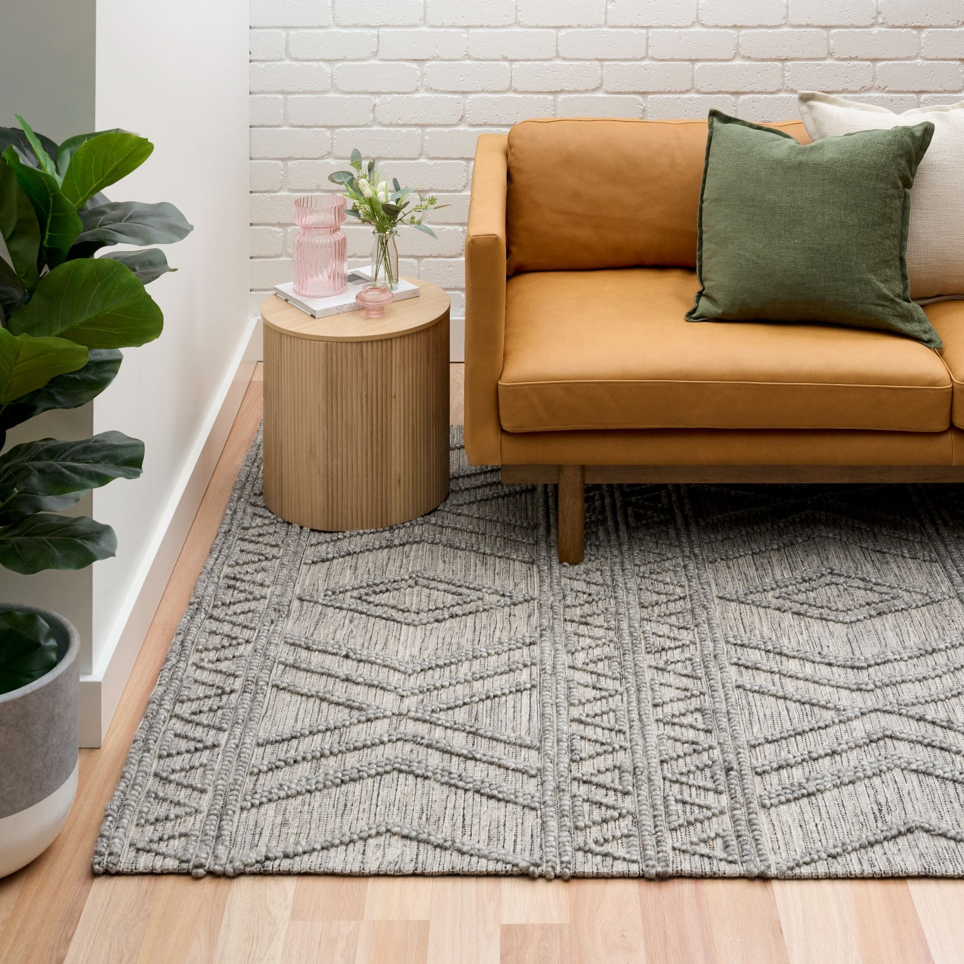 Anita-2 Grey is a hand woven textured wool rug. Featuring a tribal geometric design.  Colour Charcoal. Sizes 155 X 225, 200 X 290, 240 X 340 and 300 X 400. Life.
