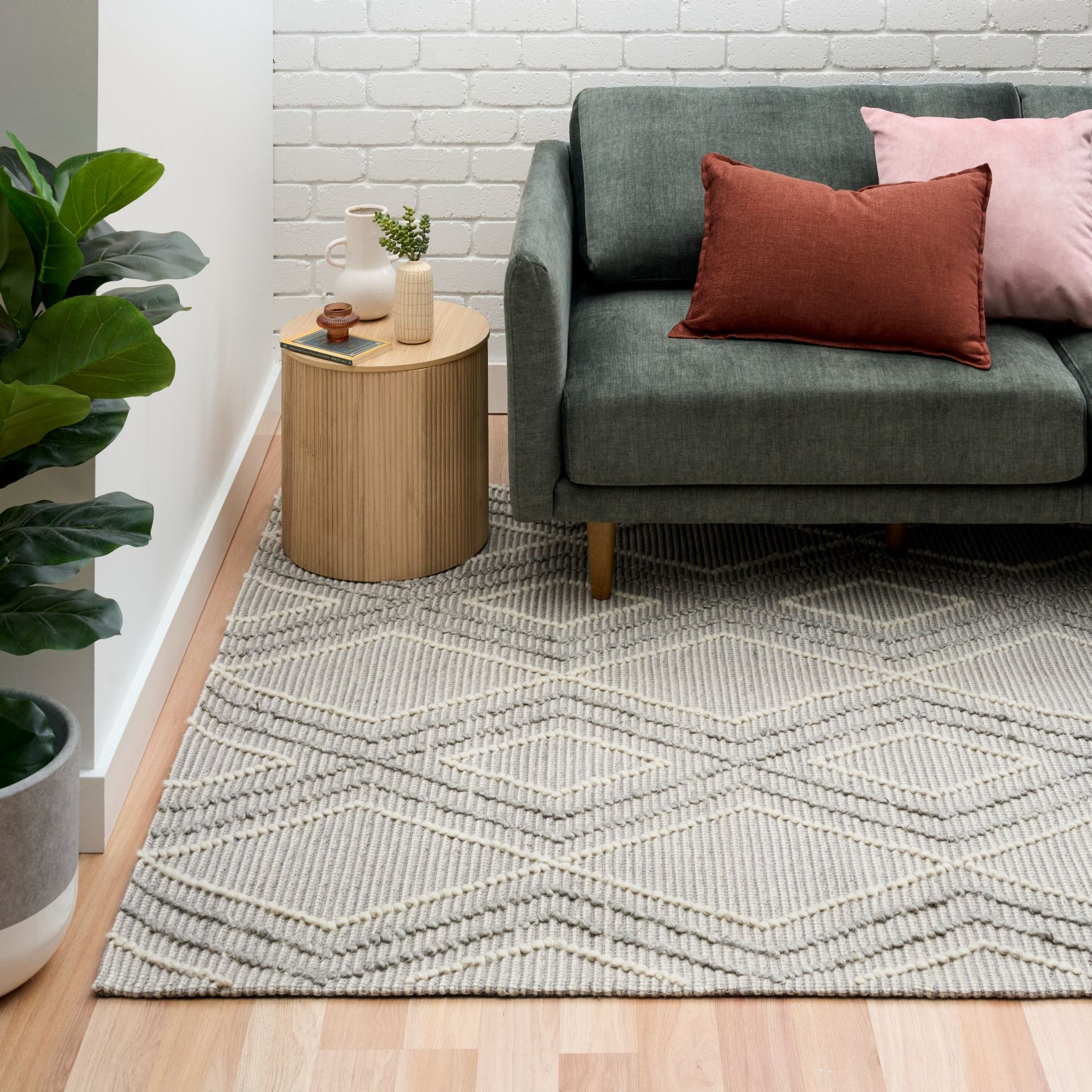 Anita Silver is a hand woven textured wool rug. Featuring a tribal geometric design with a 6-8mm pile height.  Colour Silver Grey, Grey and White. Sizes 155 X 225, 200 X 290, 240 X 320 and 300 X 400. Life.