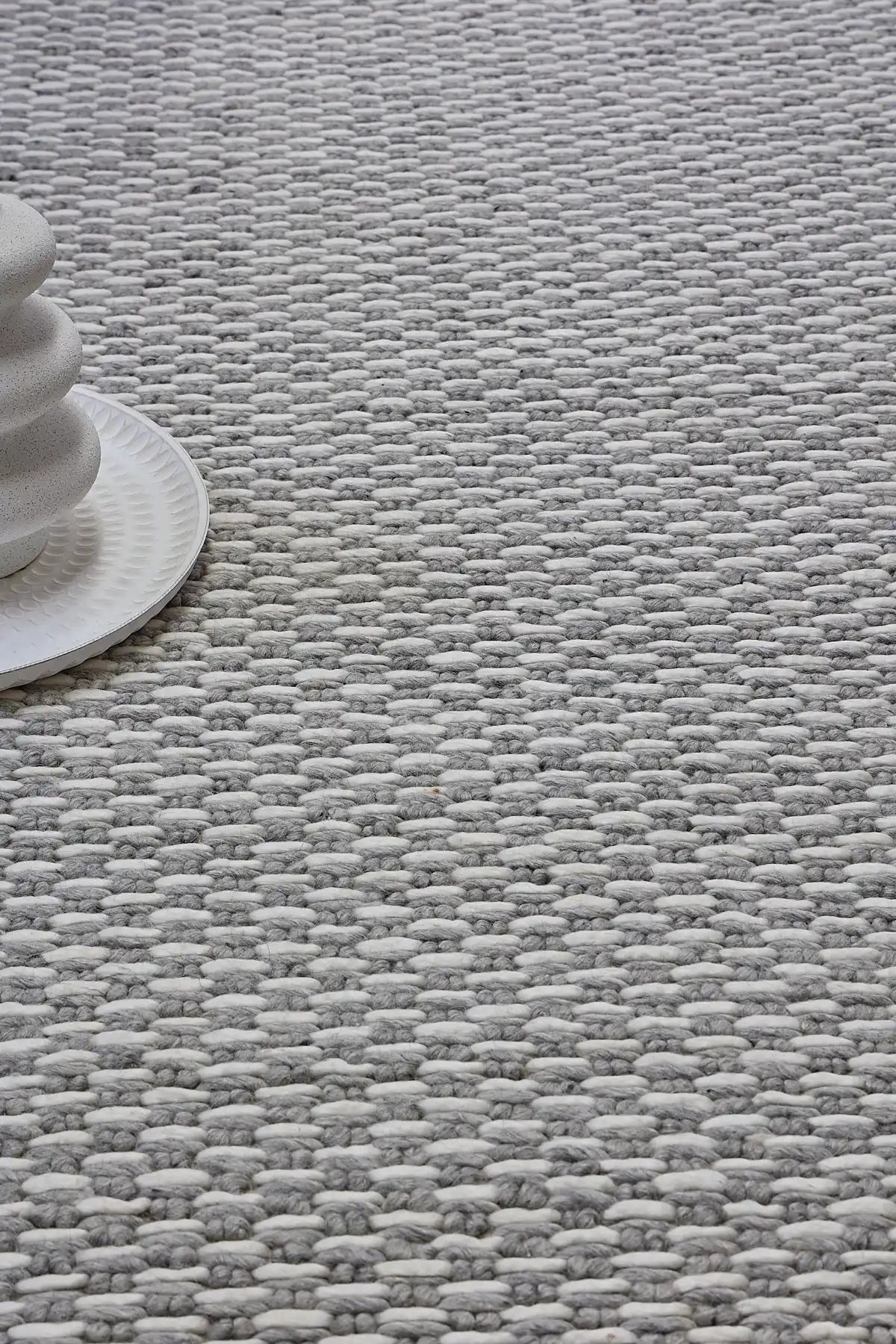 Ankara Silver is a Hand-woven, loop-textured rug crafted from a luxurious combination of wool and bamboo silk. Colours Silver and Grey. Sizes 160 X 230, 200 X 290, and 240 X 340. Life.