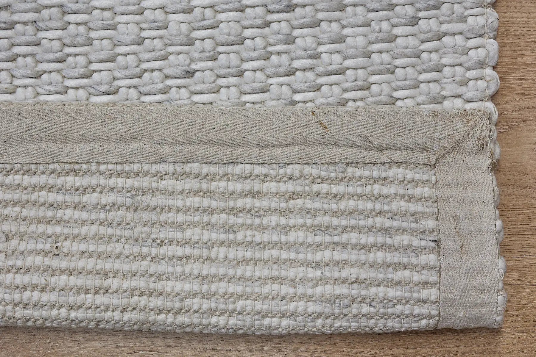 Ankara White/Cream is a Hand-woven, textured rug crafted from a luxurious combination of wool and bamboo silk. Colour White/Cream. Sizes 160 X 230, 200 X 290, and 240 X 340. Fold.