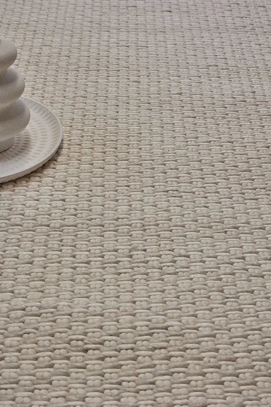 Ankara White/Cream is a Hand-woven, textured rug crafted from a luxurious combination of wool and bamboo silk. Colour White/Cream. Sizes 160 X 230, 200 X 290, and 240 X 340. Life.