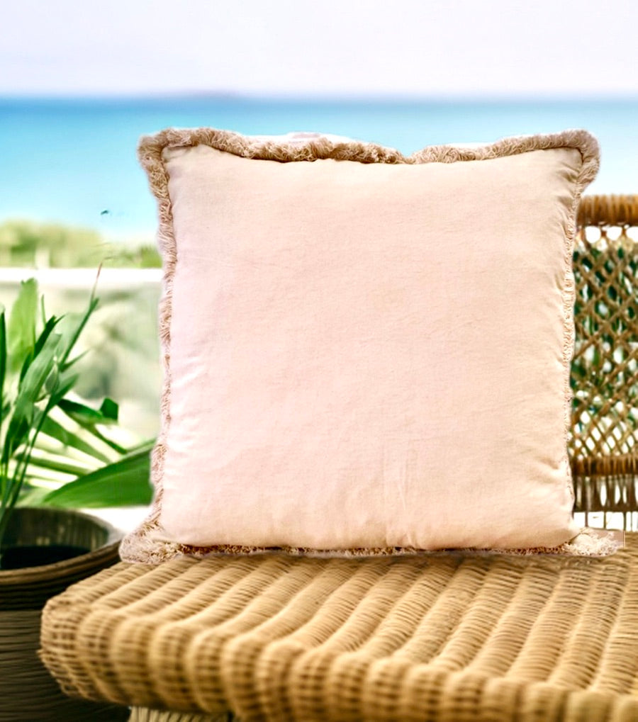 Our Antique Cream, cushion is hand crafted in India by skilled artisans. Features a soft feel, with small fringes around the edges. Colour Cream. Sizes 50 X 50 and 60 X 60. Styled.