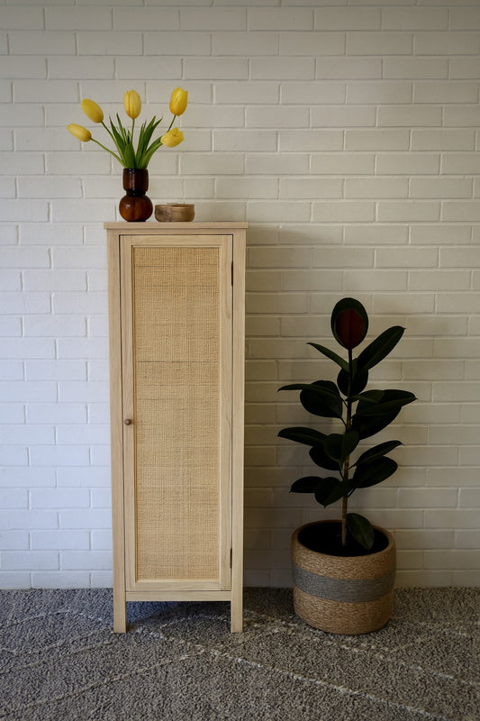 Aquarius 1 Door Cabinet. A refined storage solution designed for contemporary living. Crafted from Solid white cedar with a close rattan mesh door front. Colour Natural. Measures 500 wide x 1650 height x 400 Depth. Styled.