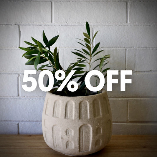 The Archer Ceramic Pot, simplistic contemporary style. With its slight textured sides and neutral tones it will be a good choice for any area. Colour White/Cream. Measures 16 Diameter X 16 Height. Sale.