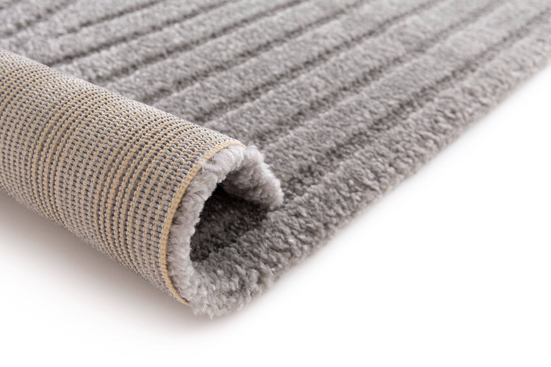Arches - Grey, a modern rug design crafted with a unique blend of Heat Set Polypropylene and Polyester shrink yarn. Roll.
