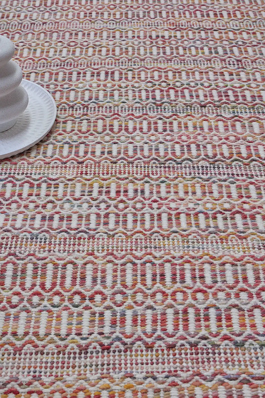 Arizona - Cherry is a Hand Woven Wool Flatweave. With a Geometric Tribal Design. Colour White with Red and Orange accents. Sizes, 160 X 230, 200 X 290 and 240 X 340. Life 