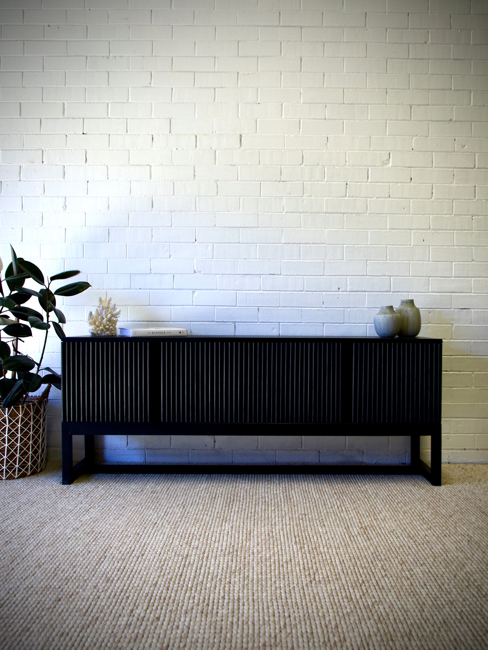 The Astoria 4 Door Black buffet is a contemporary styled piece. Crafted from sustainable white cedar, it features 4 textured doors. Colour Black. Measures 1800 length X 400 depth X 700 height. Front Styled.