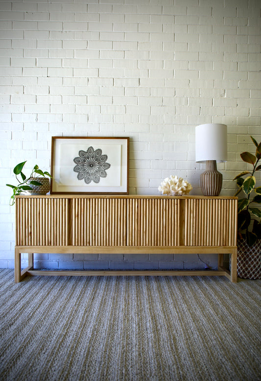 The Astoria 4 Door Natural buffet is a contemporary styled piece. Crafted from sustainable white cedar, it features 4 textured doors. Colour natural. Measures 1800 length X 400 depth X 700 height. Front Styled.