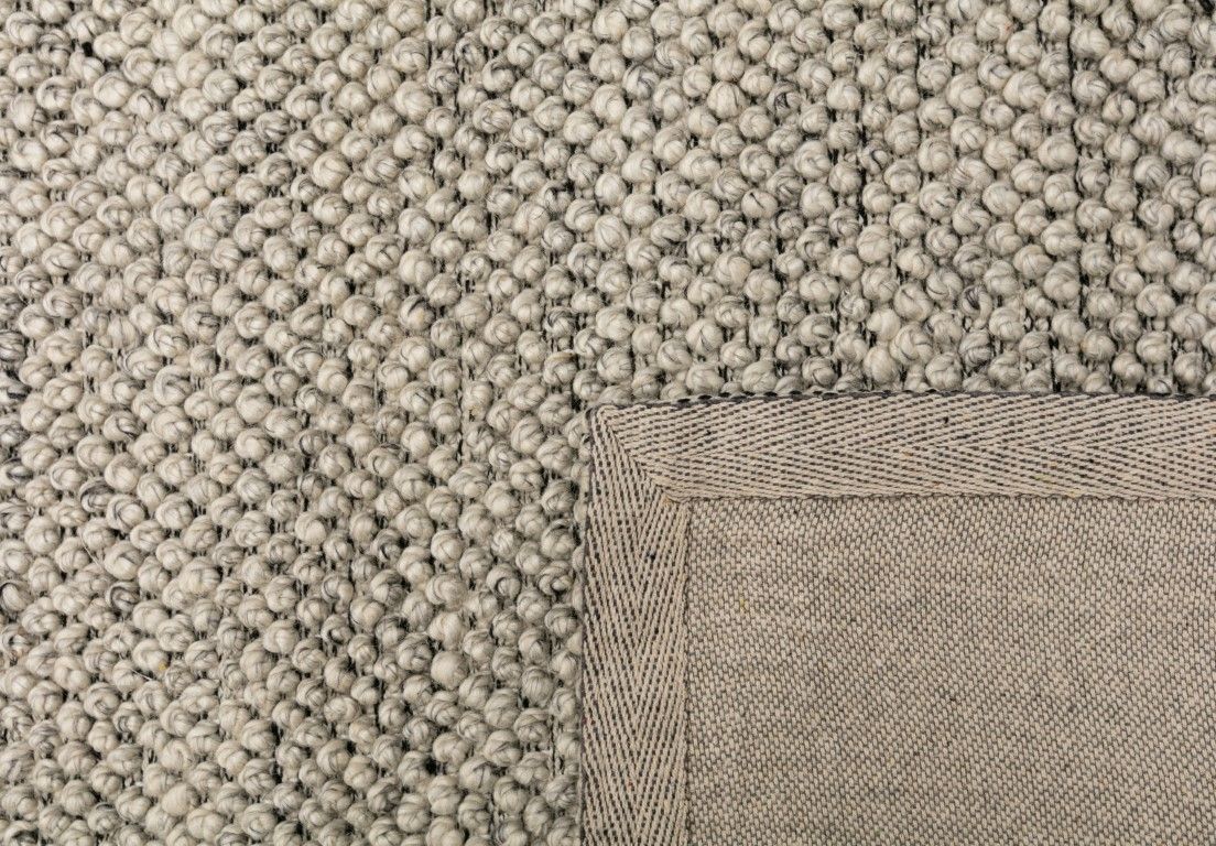 Avenue Timeless Grey is a hand woven PET Yarn (Recycled Plastics) Rug.  It features a soft wool-like feel with a modern/contemporary design.  Colours Light Grey, White with Black accents. Sizes 155 X 225, 200 X 290, 240 X 320 and 300 X 400. Fold.