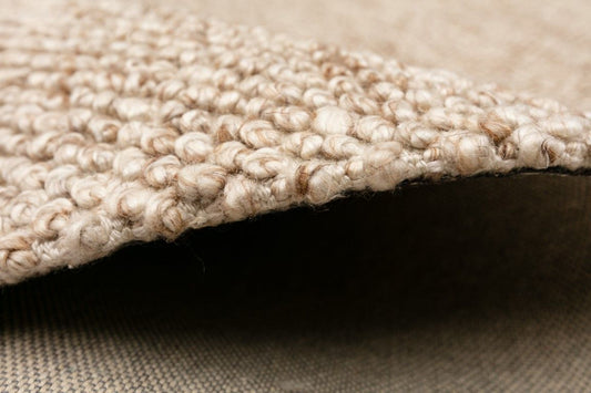 The Avenue 160 Round Beige Rug in durable PET yarn with a wool-like feel. Size 160 Diameter. Side.
