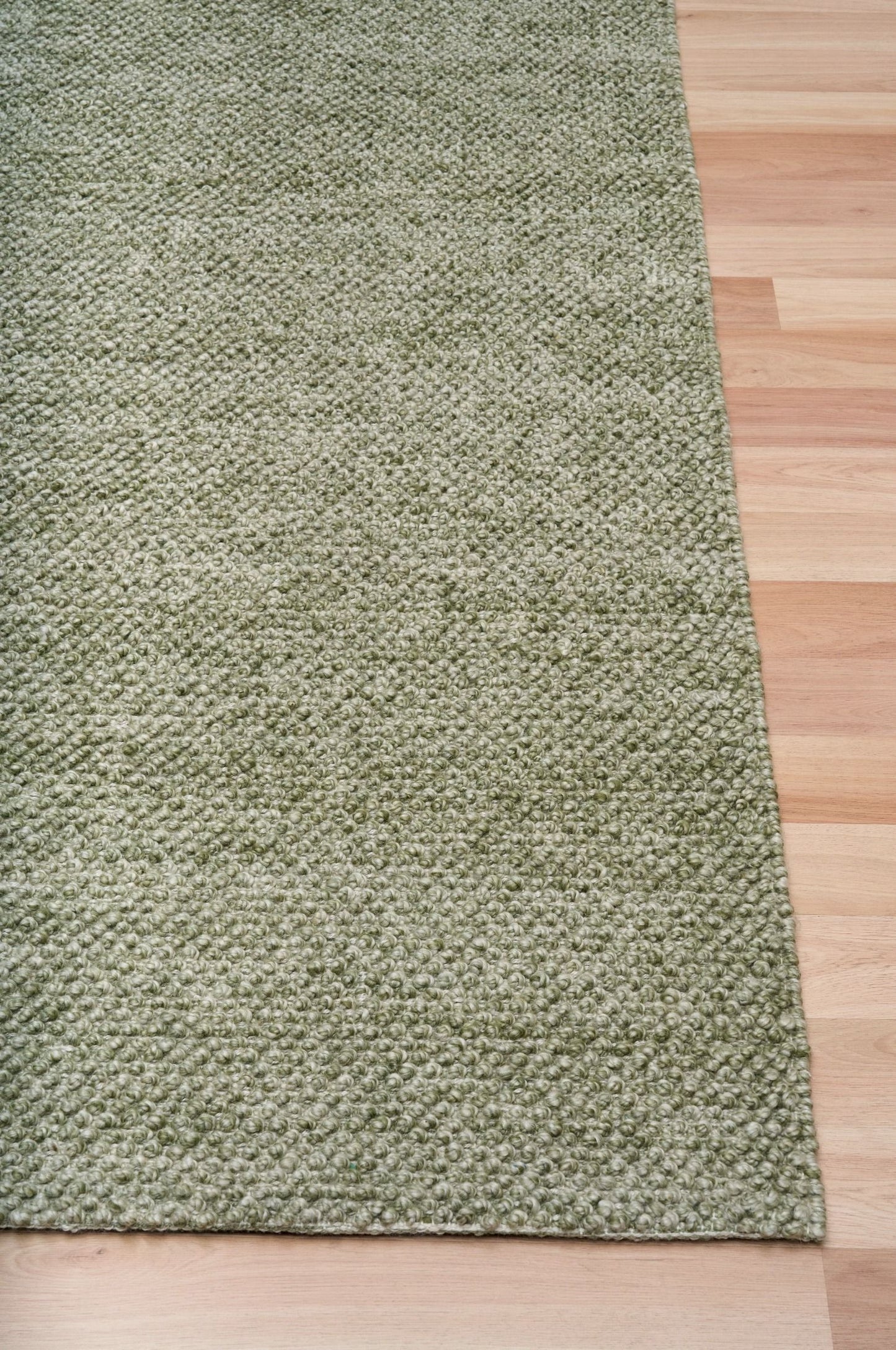 Avenue Pesto is a hand woven PET Yarn (Recycled Plastics) Rug.  It features a soft wool-like feel with a modern/contemporary design.  Colour Pesto Green. Sizes 155 X 225, 200 X 290, 240 X 320 and 300 X 400. Corner.