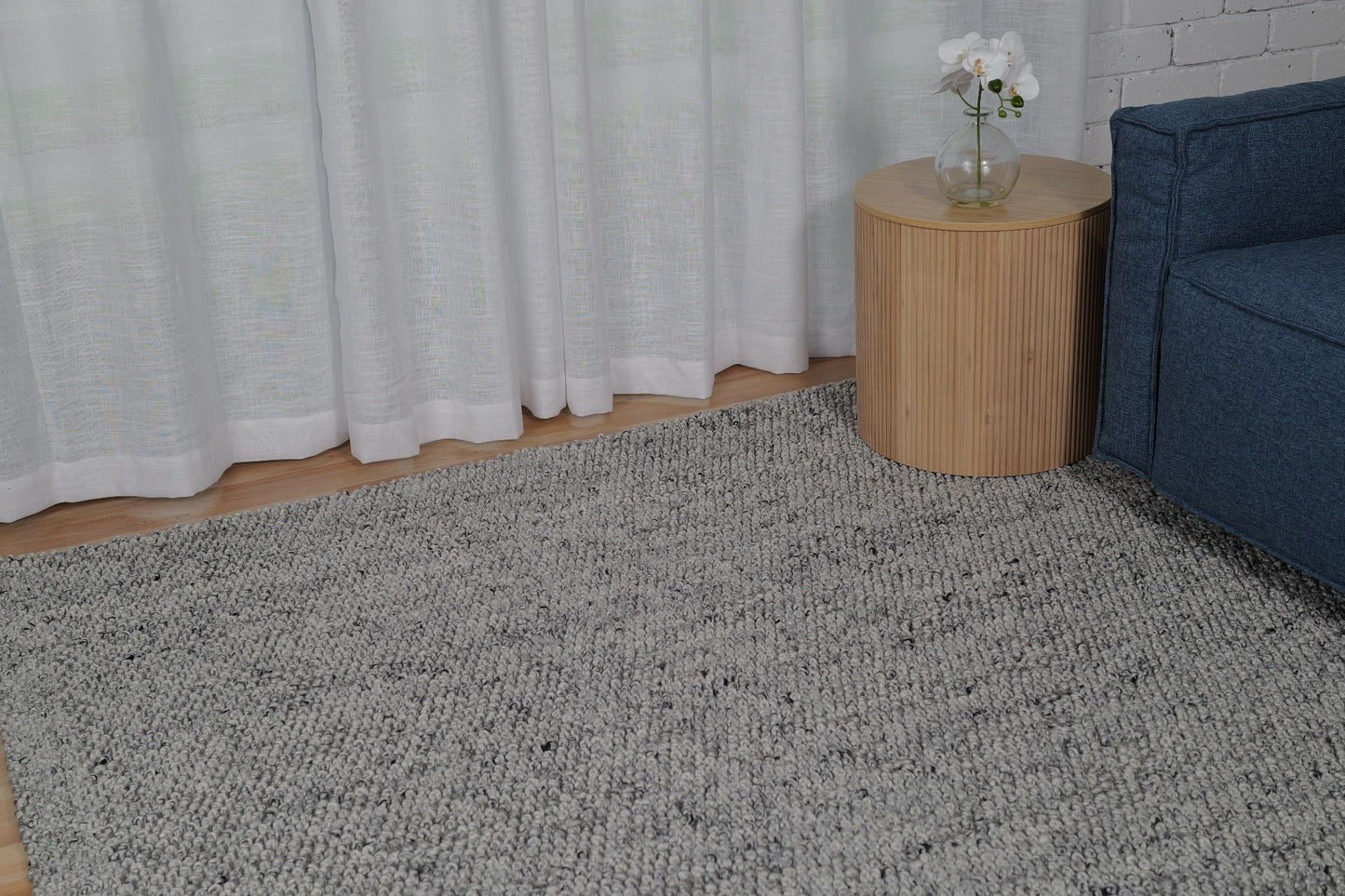 Avenue Shale is a hand woven PET Yarn (Recycled Plastics) Rug.  It features a soft wool-like feel with a modern/contemporary design.  Colour Shale, grey white and black. Sizes 155 X 225, 200 X 290, 240 X 320 and 300 X 400. Styled.