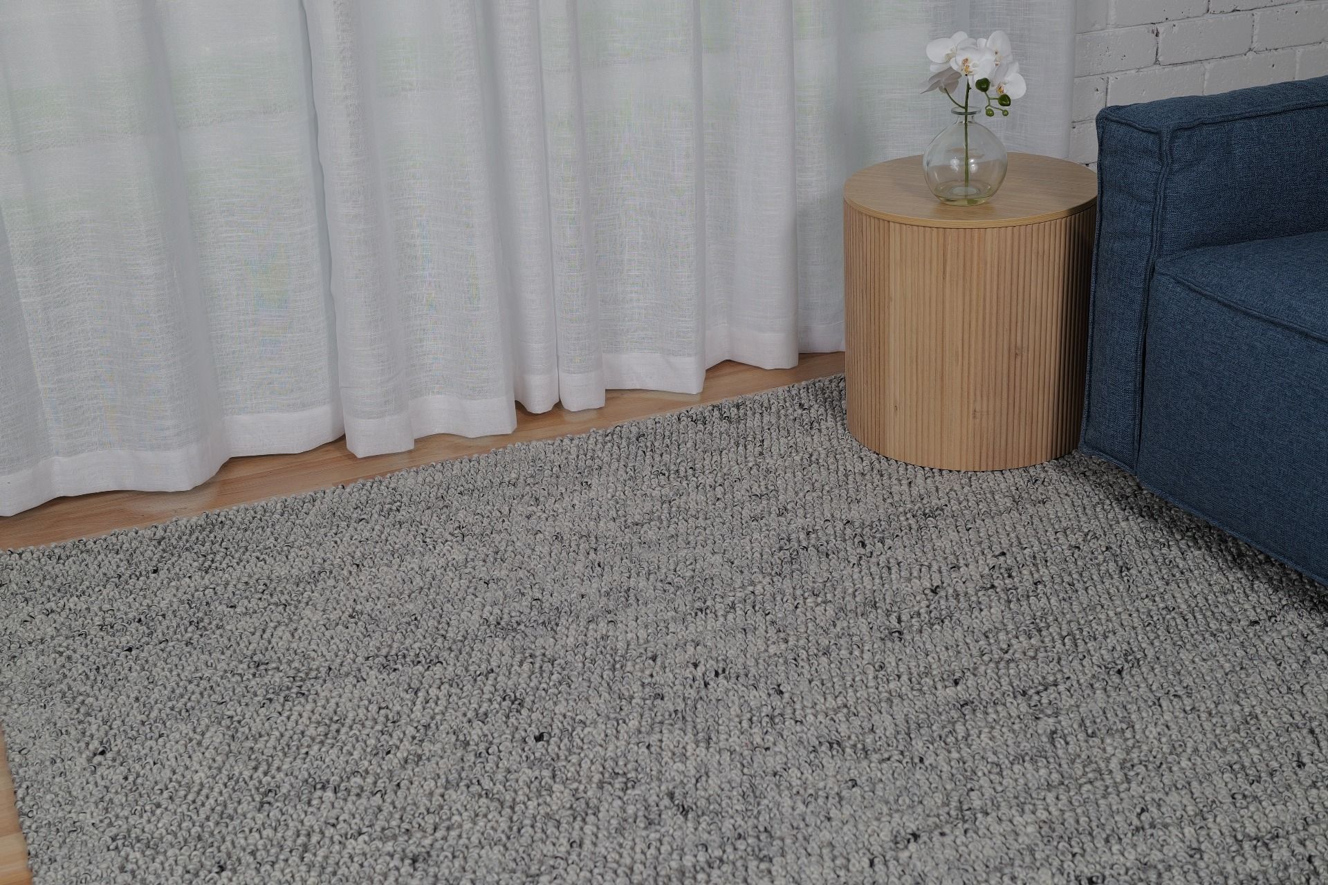 Avenue Shale is a hand woven PET Yarn (Recycled Plastics) Rug.  It features a soft wool-like feel with a modern/contemporary design.  Colour Shale, grey white and black. Sizes 155 X 225, 200 X 290, 240 X 320 and 300 X 400. Styled.