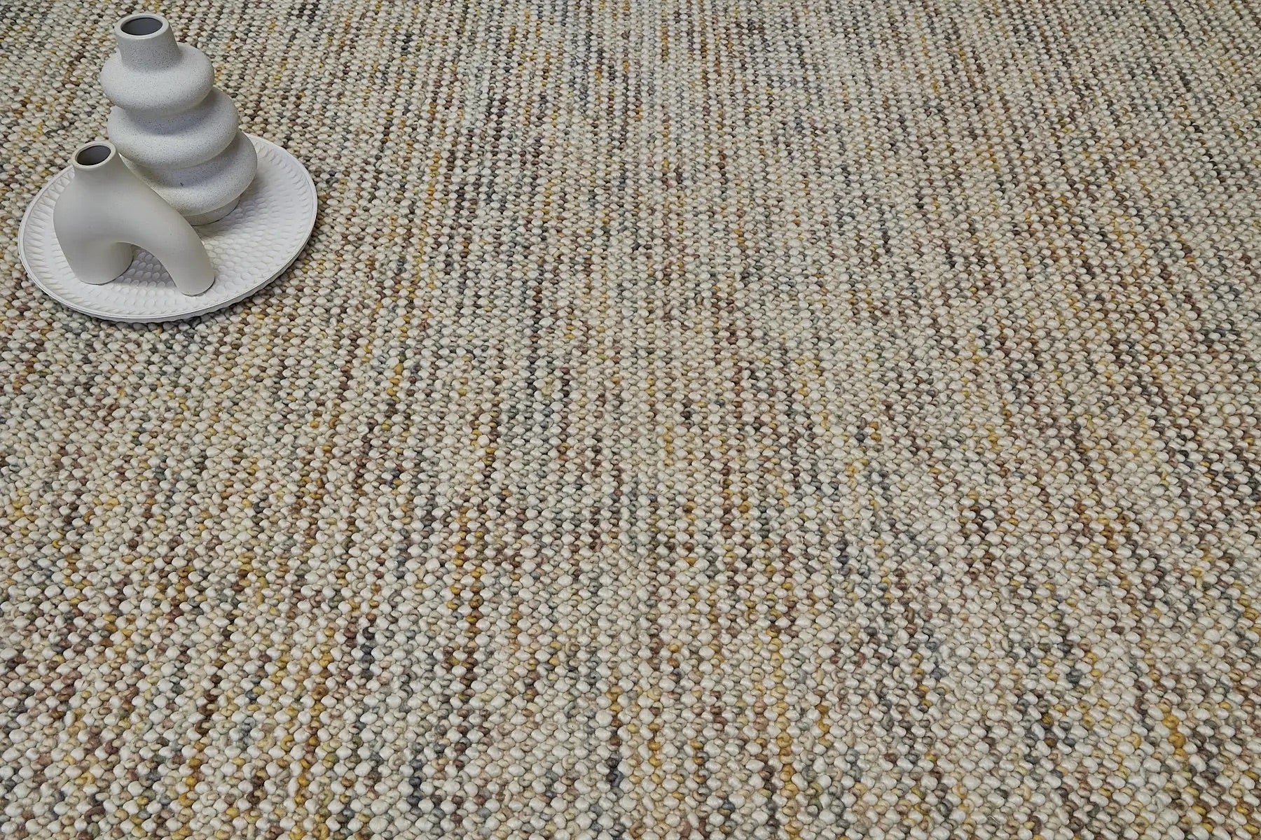 Avila - Sand is a handwoven loop piled carpet. It features a blend of fine wool and viscose, with a pile height of 16-18mm. Colours Cream with Brown, Beiege and Yellow accents. Sizes 160 X 230, 200 X 290 and 240 X 340. Life