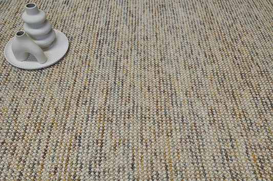 Avila - Sand is a handwoven loop piled carpet. It features a blend of fine wool and viscose, with a pile height of 16-18mm. Colours Cream with Brown, Beiege and Yellow accents. Sizes 160 X 230, 200 X 290 and 240 X 340. Life