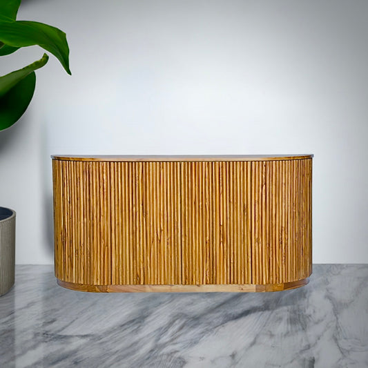 The Baker 2 Door Buffet. Feature a textured front with stylish curved ends. Ample storage. Colour Natural. Measures 1800 length x 900 height x 450 depth. Styled.