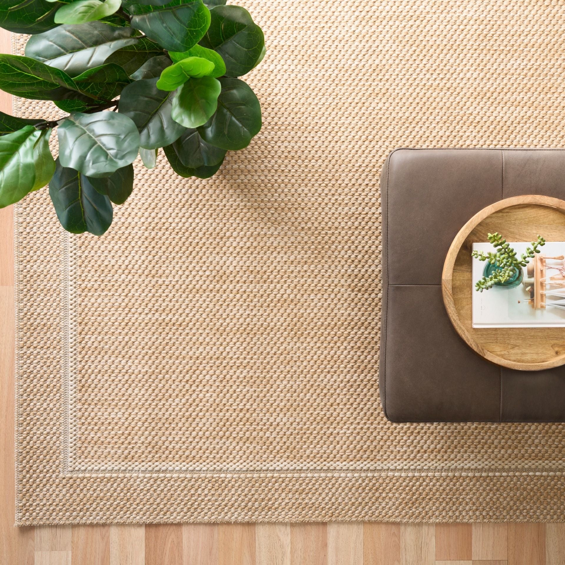 Barton Border Beige indoor/outdoor rug featuring soft beige tones and a subtle textured pattern, power-loomed from UV-stabilised polypropylene for lasting durability. Colour Beige. 3 sizes. Life.