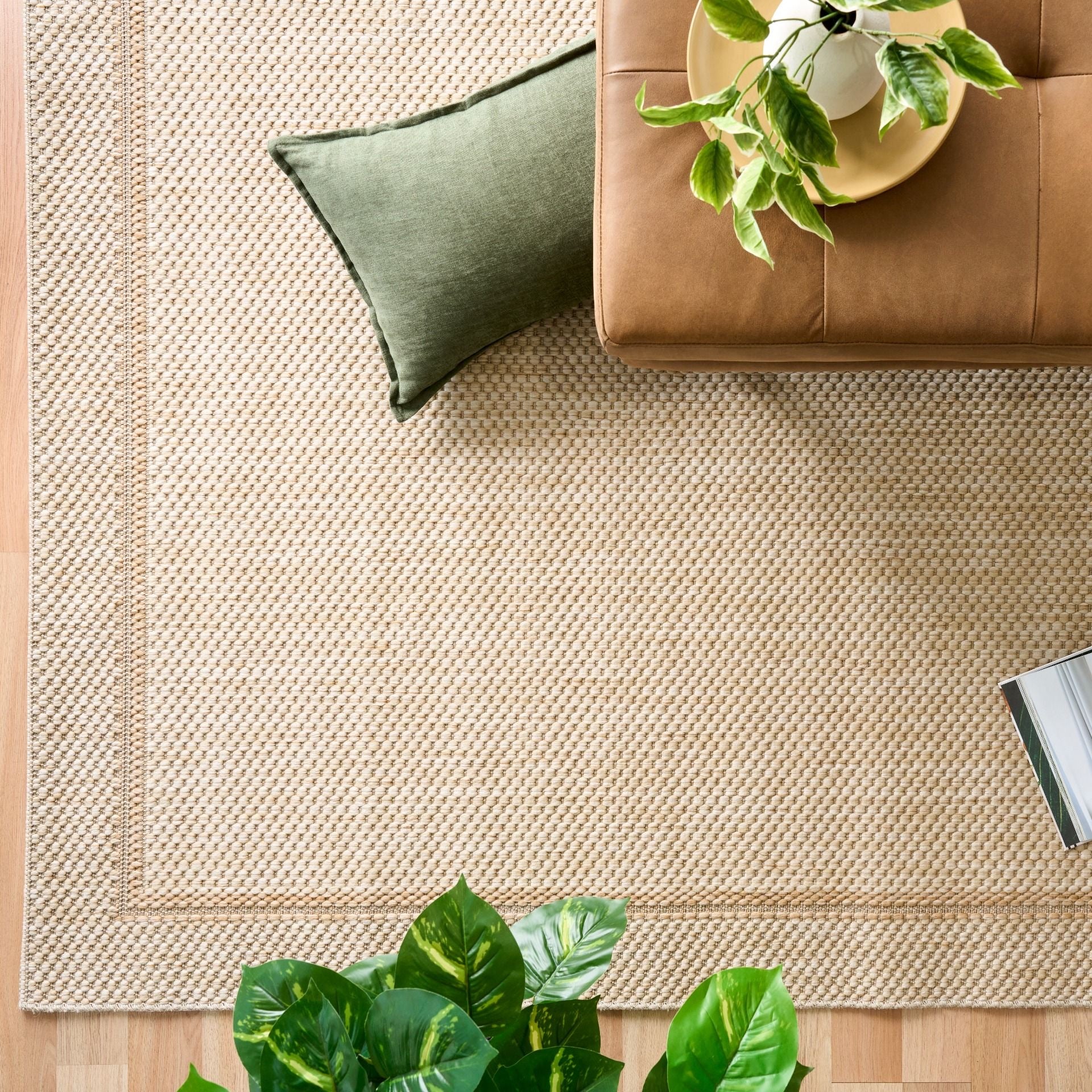 Barton Border Cream indoor/outdoor rug featuring soft cream tones and a subtle textured pattern, power-loomed from UV-stabilised polypropylene for lasting durability. Colour Cream. 3 sizes. Life.
