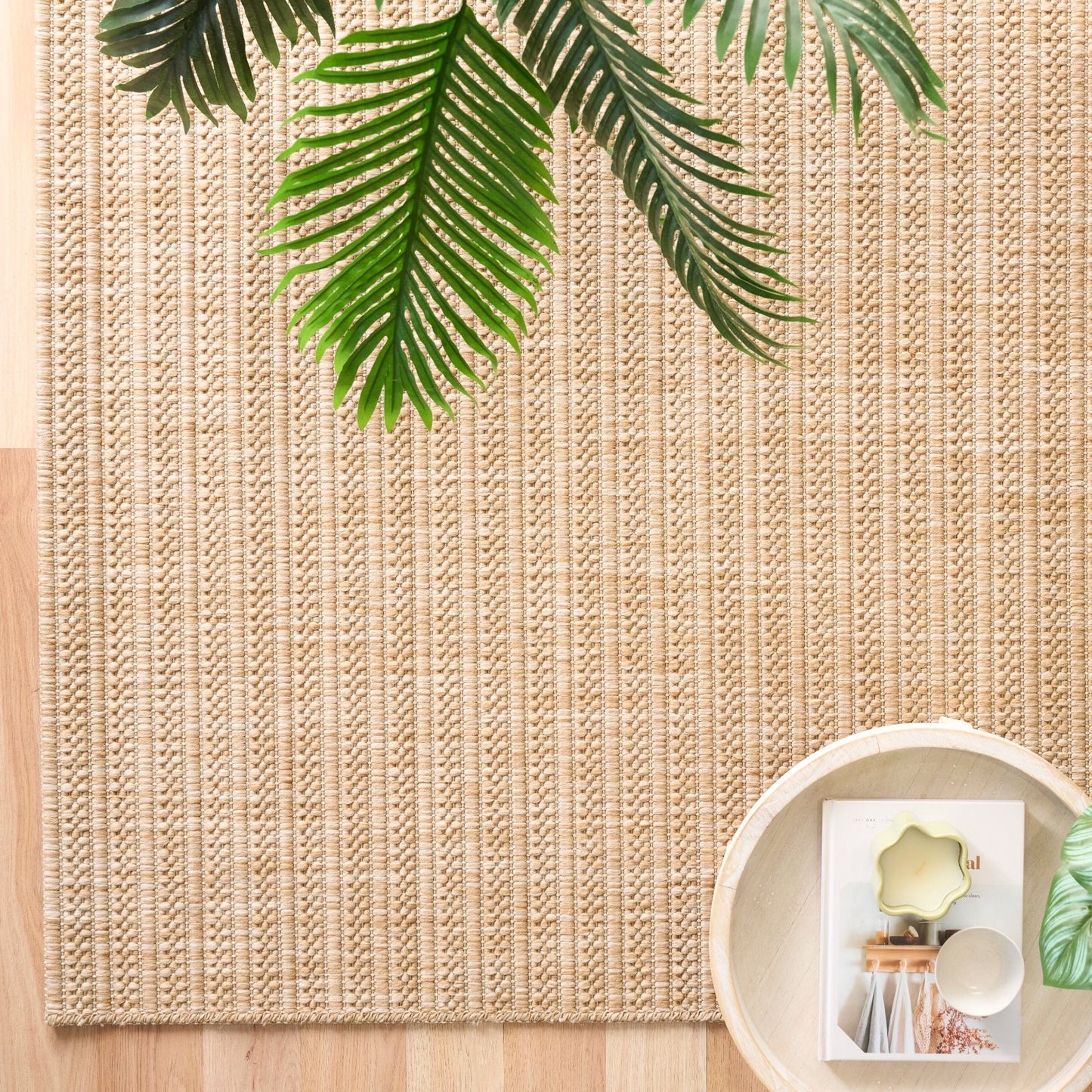 Barton Linear Beige indoor/outdoor rug featuring soft beige tones and a subtle textured pattern, power-loomed from UV-stabilised polypropylene for lasting durability. Colour Beige. 3 sizes. Life.