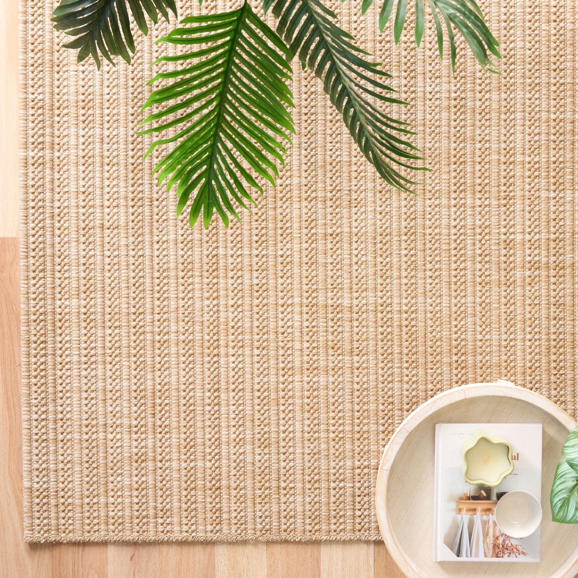 Barton Linear Beige indoor/outdoor rug featuring soft beige tones and a subtle textured pattern, power-loomed from UV-stabilised polypropylene for lasting durability. Colour Beige. 3 sizes. Life.