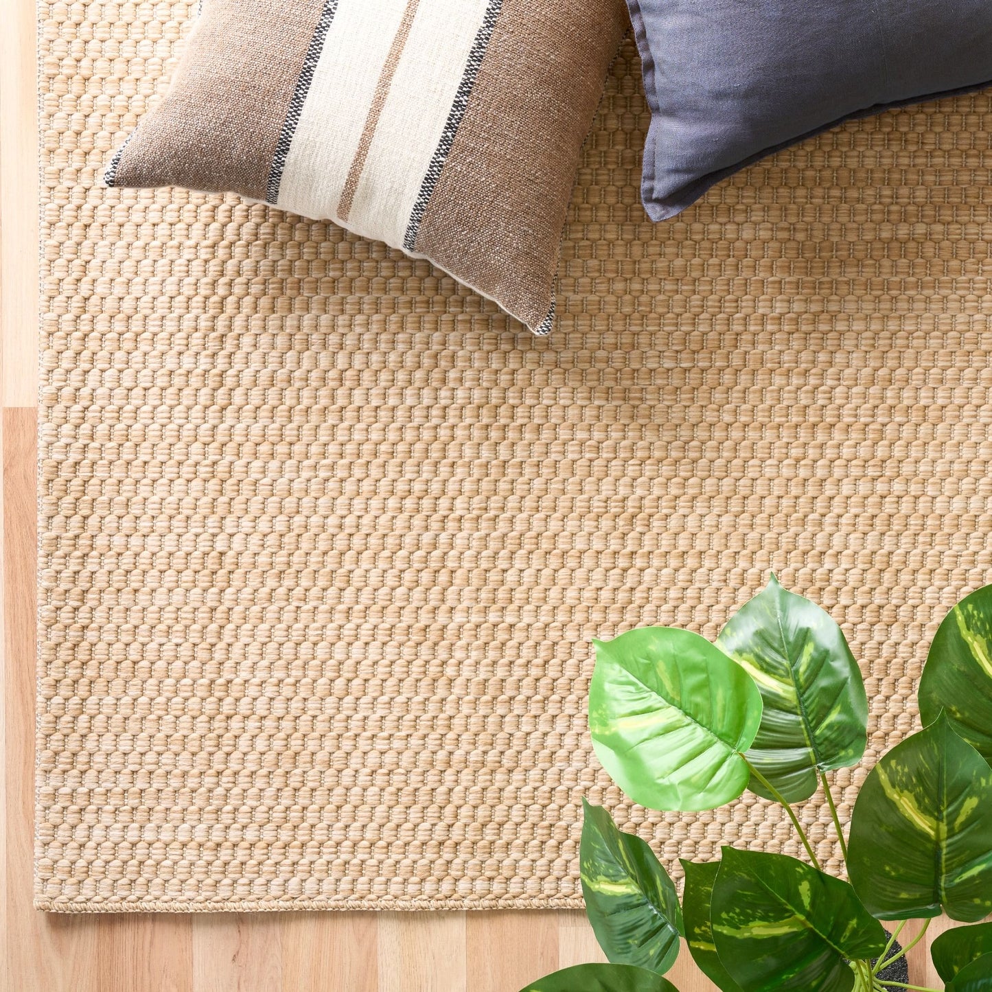 Barton Twill Beige indoor/outdoor rug featuring soft beige tones and a subtle textured pattern, power-loomed from UV-stabilised polypropylene for lasting durability. Colour beige. 3 sizes. Life.
