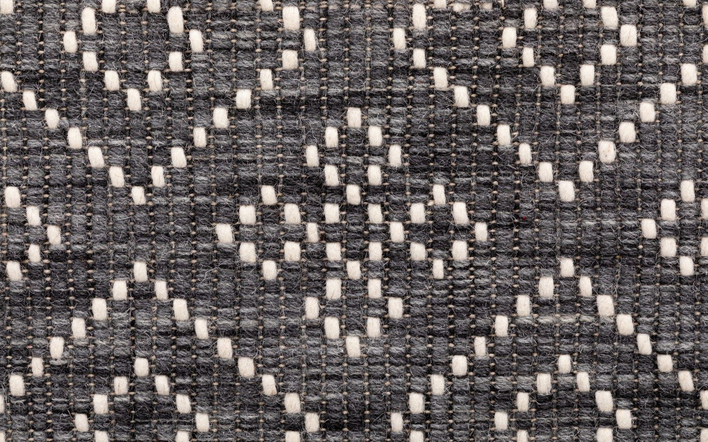 Bellevue Grey is a textured hand woven  wool and viscose rug.  Featuring a tribal diamond aztec design. Colours Grey with White Patterns. Sizes 155 X 225, 200 X 290 and 300 X 400. Close.
