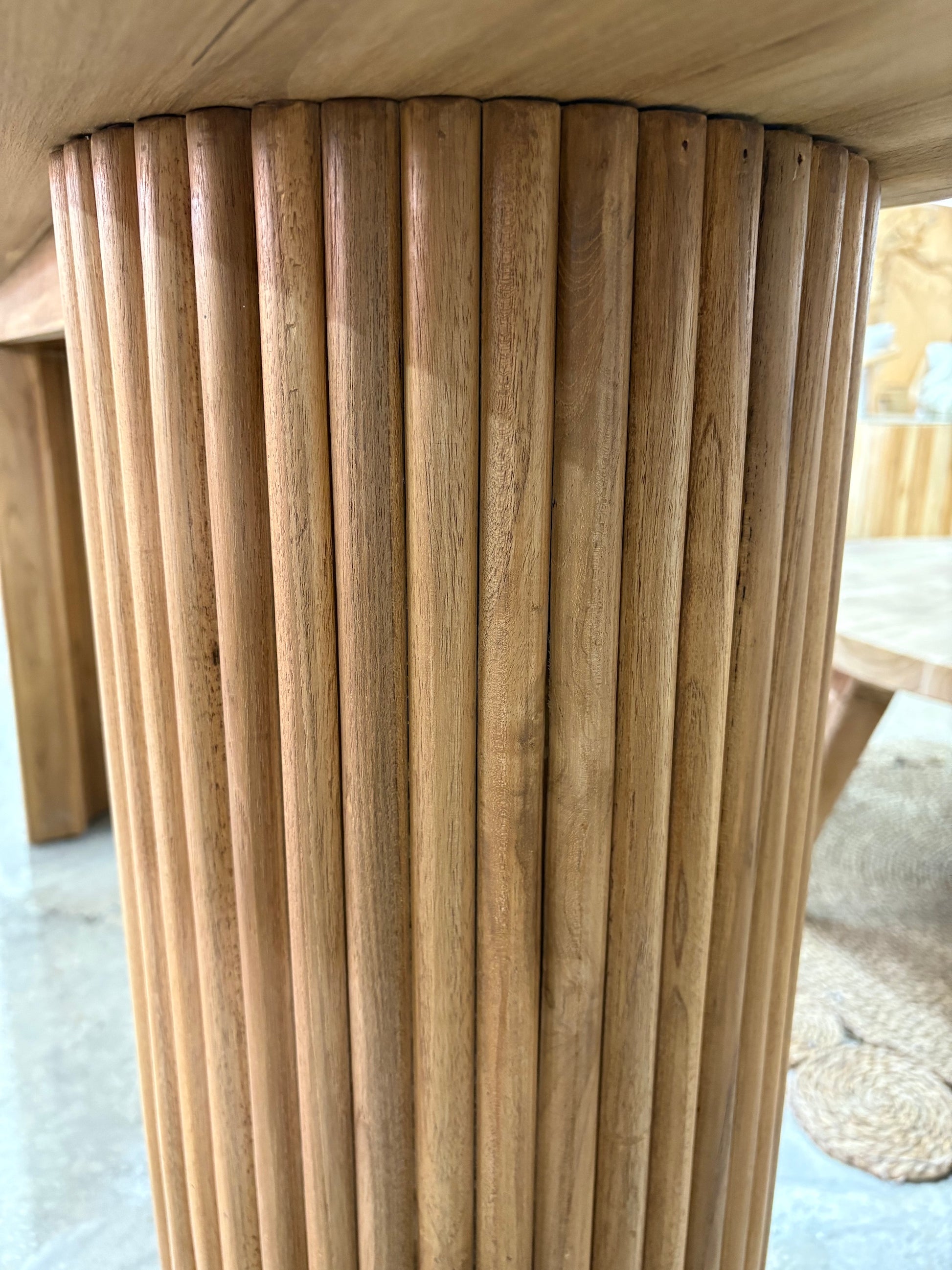 Berlin Teak Top Console crafted from solid teak. Featuring solid teak top with rounded ends and solid fluted pillar supports. Colour Natural Teak. Measures 1600 Wide X 350 Depth X 7500 Height. Outside Leg.