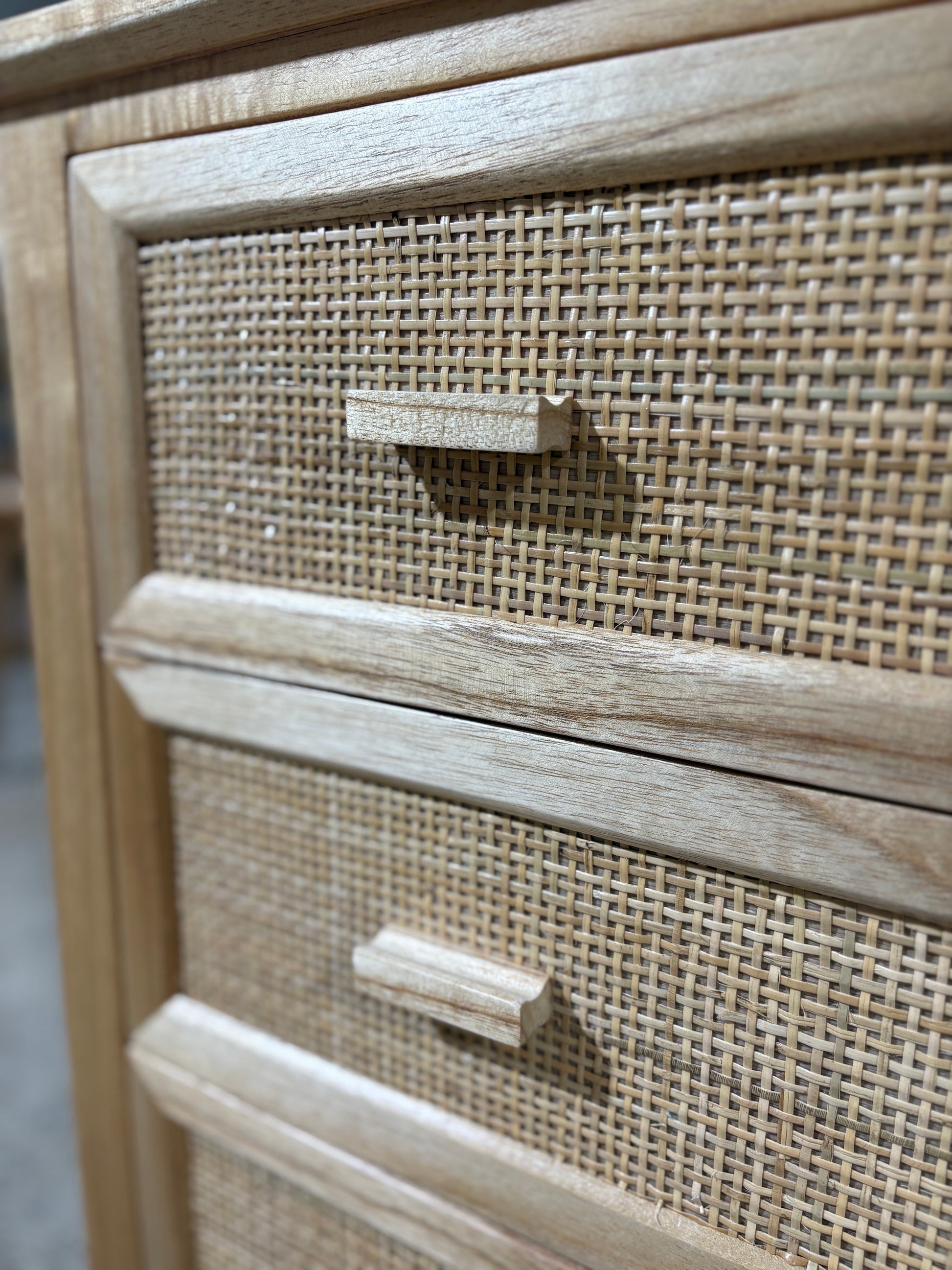 The Booderee 3 Drawer Chest is a coastal/contemporary chest made of natural white cedar and features a closed mesh rattan drawer front. Colour natural. Measures 800 length X 400 depth X 700 height. Close.