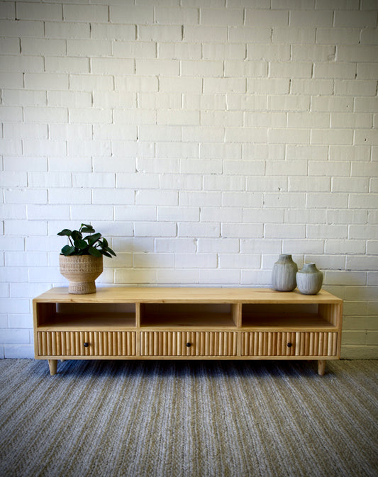 The Brando 3 Drawer Natural Entertainment Unit is a modern/contemporary designed piece. It has 3 textured drawers and 3 open shelves. Crafted from sustainable white cedar. Colour natural. Measures 1500 length X 400 depth X 400 height. Front Styled.
